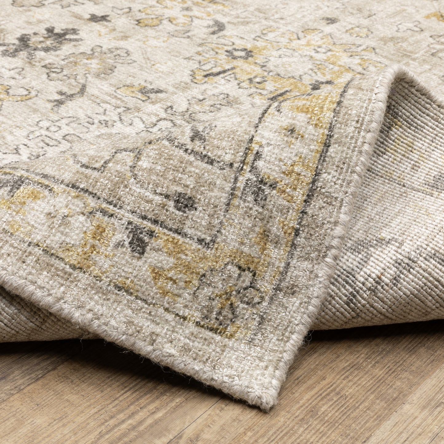 Windham Floral Beige/ Gold Distressed Cut Pile Rug