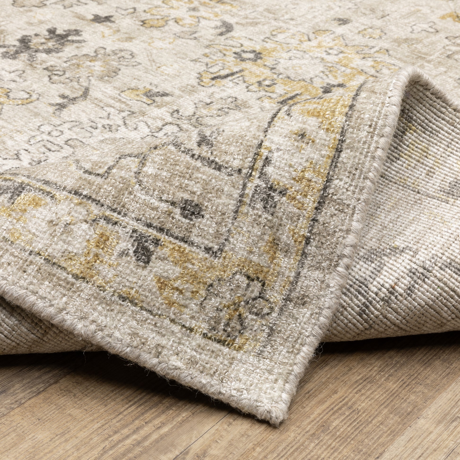 Windham Floral Beige/ Gold Distressed Cut Pile Rug