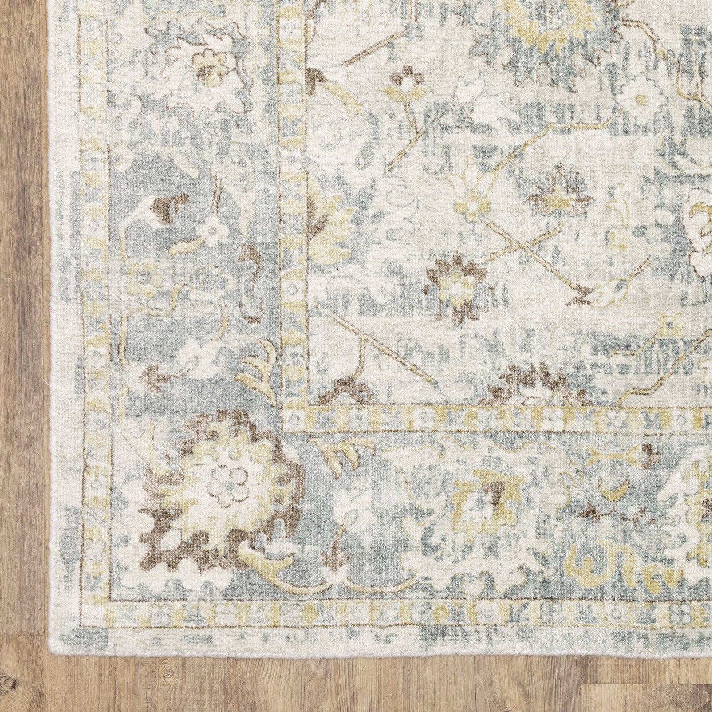 Windham Floral Ivory/ Blue Distressed Cut Pile Rug